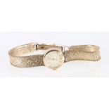 9ct yellow gold ladies Cortina wristwatch on 9ct gold bracelet, 18.3g.