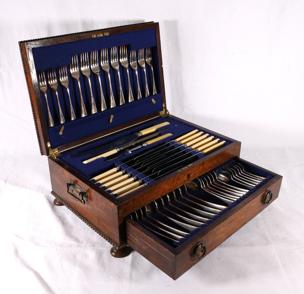 Early 20th century oak cased canteen of EPNS cutlery by Edwin Blyde & Company of Sheffield.