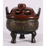 Chinese bronze censer and carved and pierced wooden cover,