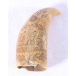 Possibly 19th century marine ivory tooth with scrimshaw decoration depicting man-o-war within