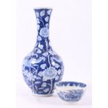 19th century Chinese blue and white bottle vase decorated with confronting dragons,