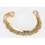18ct gold articulated necklace with banded links, hallmarked 750, approximately 34g gross.
