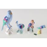 A group of Herend porcelain birds, miniature emu, canary on corn, another and a larger canary,