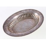 20th century silver oval dish, with beaded border stamped 'sterling', 27cm long, 333g.