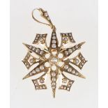 Victorian gold brooch, the pendant of star and drop form, pearl set, "15ct".