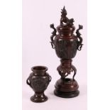 Large Japanese bronze censer in the form of a vase on a triple support tiered base and dragon