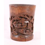 Chinese carved bamboo brush pot depicting fishermen on a river, 19cm.