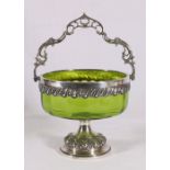 WMF silver plate mounted green glass pedestal bowl with swing handle, 17cm.