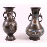 Chinese 19th century bronze champleve vase of pear shape with flaring rim and dragon loop handles,