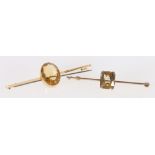 Two 9ct gold bar brooches set with faceted citrines, 6cm, 9.5g.