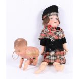 Armand Marseille of Germany 390 articulated bisque headed sleepy eye doll in tartan dress and a