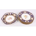 Set of six Royal Crown Derby gilt porcelain floral specimen plates 22cm dia.