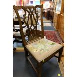 Wheeler of Arncroch type mahogany gossip chair.