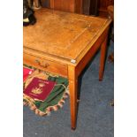 19th century mahogany and inlaid library table with frieze drawers raised on tapering supports.