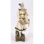 Austrian porcelain figure of an apple picker,