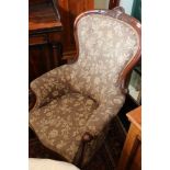 Victorian parlour chair with scroll back raised on cabriole supports.