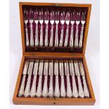 Set of twelve fish knives and forks,