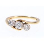 18ct gold three stone diamond ring collet set in a crossover setting 4g