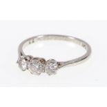 18ct white gold and platinum three stone diamond ring.