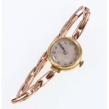 18ct gold cased ladies wristwatch on 9ct gold expanding link bracelet.