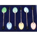 Set of six silver and enamelled coffee spoons in fitted case.