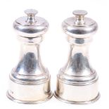 Pair of Elizabeth II silver pepper mills. London 1973. Mappin & Webb. 264g.