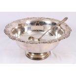 Silver plated punch bowl with vineous border,