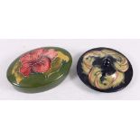 Moorcroft Pottery oval box and circular lid (2)