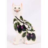 Griselda Hill cat with plum decoration,