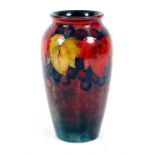 Moorcroft leaf and berries design high shouldered vase, 17.