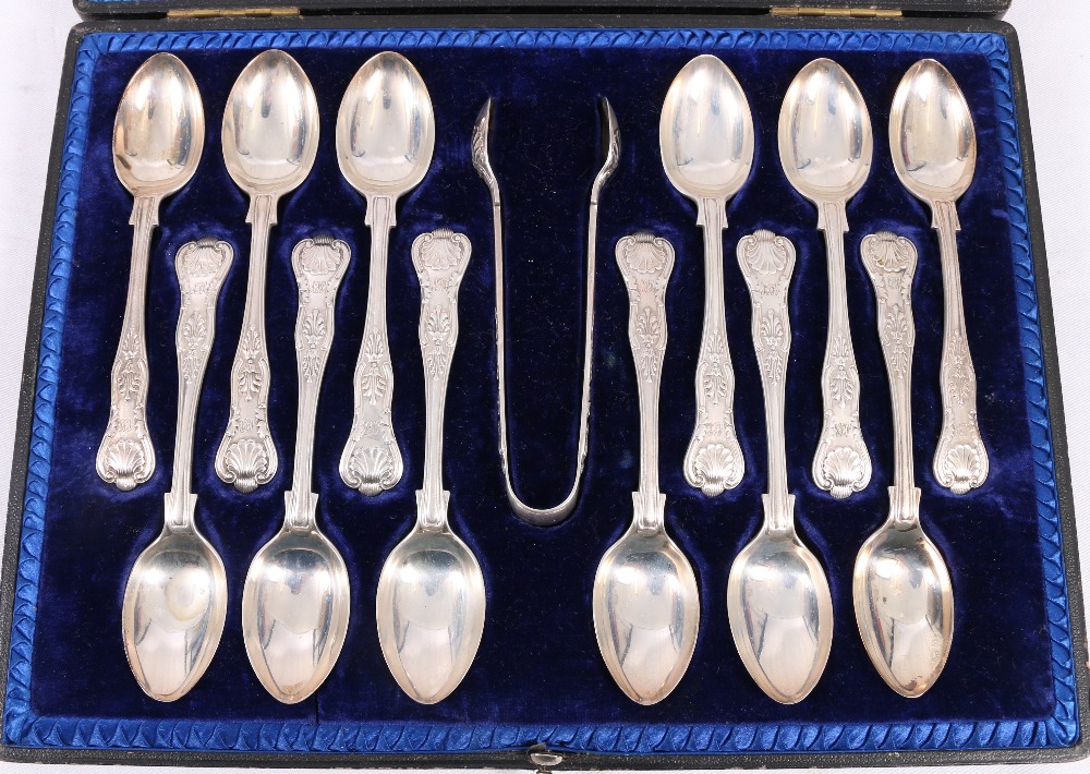 Walker & Hall set of twelve silver teaspoons and tongs,