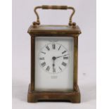 Brass carriage clock, titled "The Akrat" by Pearce of Brighton,