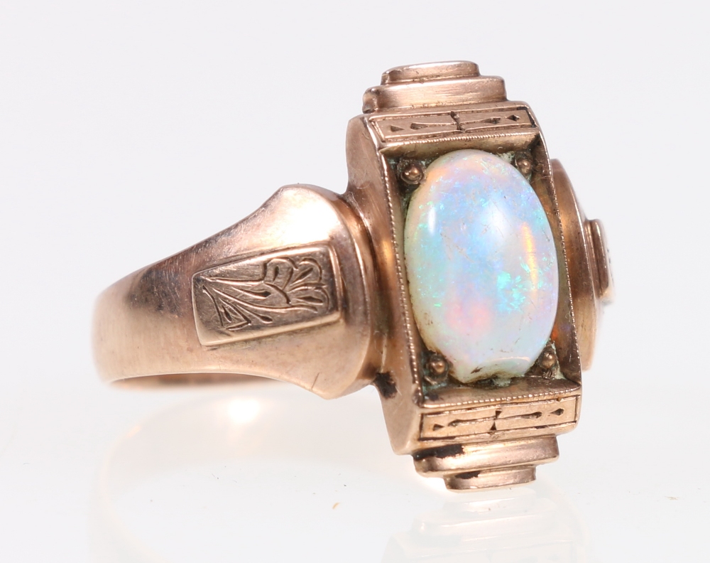 Unhallmarked opal dress ring. 4.