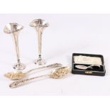 Silver christening spoon, pair of spill vases and a pair of ep berry spoons.