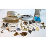 Lady's rolled gold watch, three silver toilet items and sundry silver and other jewellery.