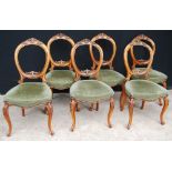 Victorian set of six walnut balloon back dining chairs with cabriole legs.