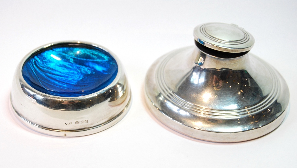 Silver circular capstan inkwell, 1919, and a mounted blue glass circular small bowl, 1927,