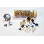 Three un-mounted cut quartz, a quantity of opal fragments and un-mounted gems.