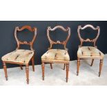 Victorian set of three rosewood dining chairs on turned legs.