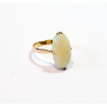 Ring with oval opal, claw-set in gold, '18k'.