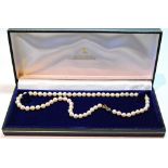 Mikimoto single strand necklace of sixty-three cultured pearls on 9ct Mikimoto snap,