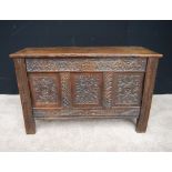 Late 17th century carved oak coffer carved with the initials 'AW' and dated '1695', on stile feet,