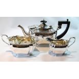 Silver three-piece tea set, rectangular with concave corners and bead border, Sheffield 1921, 30oz.