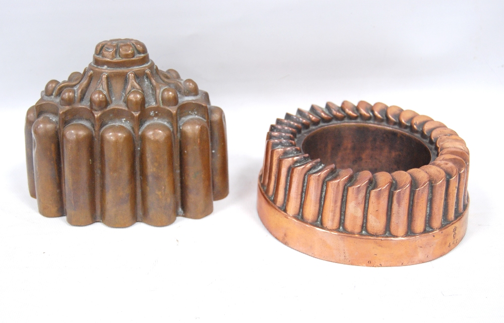 Two Benham & Froud copper jelly moulds, no. 462 and 95, 12cm and 6cm high.