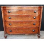 Regency mahogany chest of drawers with four long drawers flanked by rope twist columns,