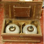 Pair of grey curling stones, the circular handles stamped 'H.P.', the leather collars stamped 'F.A.