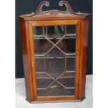 Victorian mahogany astragal glazed corner cupboard with swan neck pediment, 119cm high.