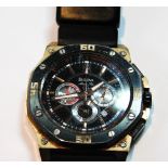 Gent's Bulova Marine Star quartz watch with gilt and black anodised case, on strap,