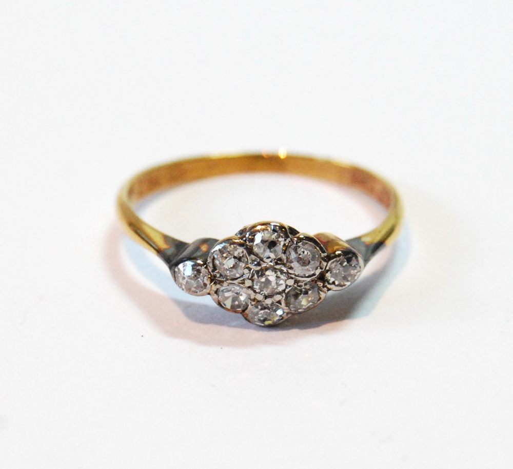 Diamond ring with a lozenge of nine small brilliants.