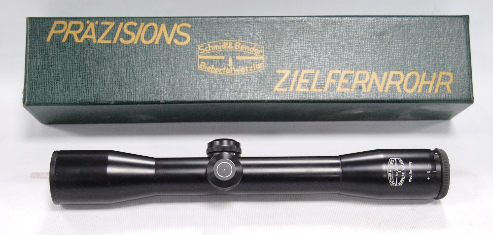 Schmidt & Bender 4 x 36 telescopic rifle sight, no. 113847, with associated box.